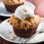 Sweet muffin with ice-cream, selective focus Spelt bran muffin topped with coconut ice cream